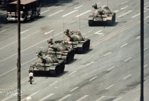 5 June 1989, close to Tiananmen square in Beijing. This man risks his life while stopping the advance of a column of tanks. His fate is unknown. (Photo: Corbis/Scanpix)